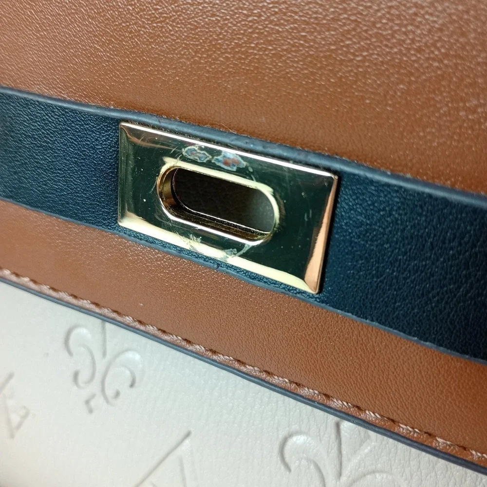 Adrienne Vittadini Cream Brown Black Gold Handbag Embossed Fleur De Lis Logo